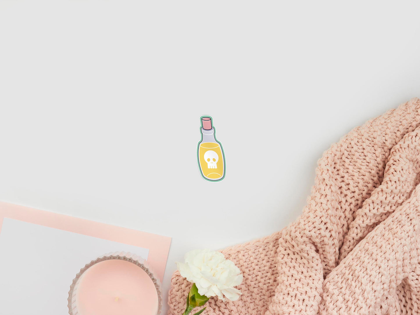 Large sticker of digital illustration cartoon of a clear potion bottle with a pink cork, filled with yellow liquid and labelled with a skull icon