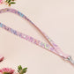 Cute full legth pink lanyard with a double sided funny worm on a string pattern and silver swivel hook clasp.
