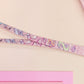 Cute full legth pink lanyard with a double sided funny worm on a string pattern and silver swivel hook clasp.