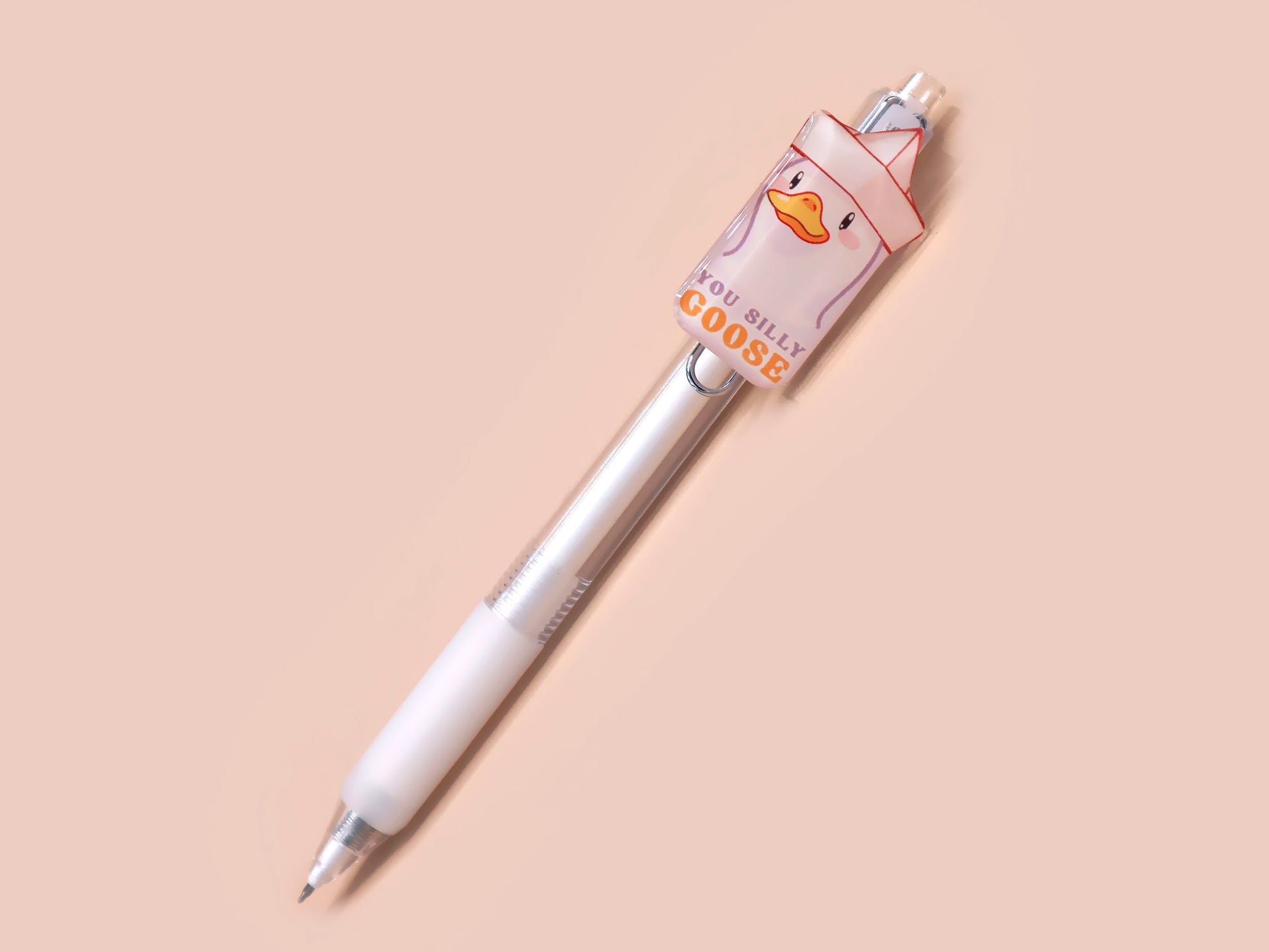 White ballpoint pen with black ink and a cute silly goose design.