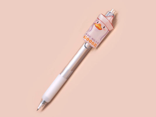 White ballpoint pen with black ink and a cute silly goose design.