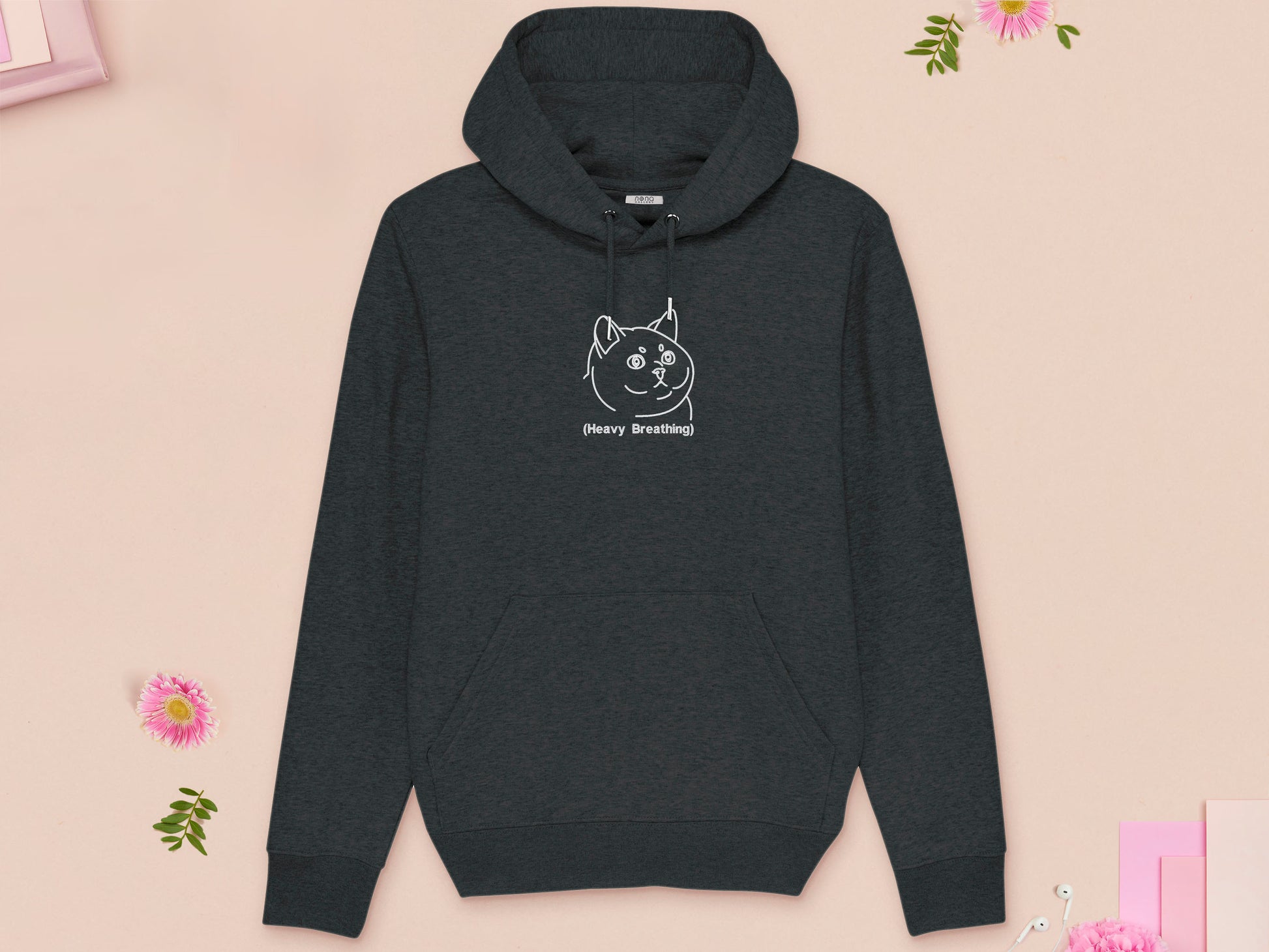 A grey long sleeve fleece hoodie, with an embroidered white thread design of cute fat cat portrait with text underneath saying (Heavy Breathing)