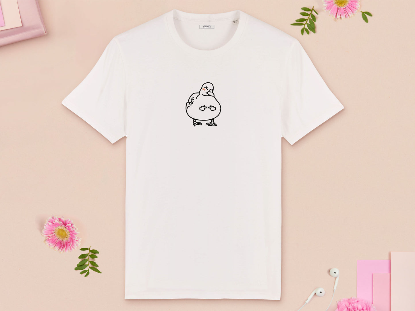 A white crew neck short sleeve t-shirt, with an embroidered black thread design of cute blushing duck with the for me finger hand emoji symbols