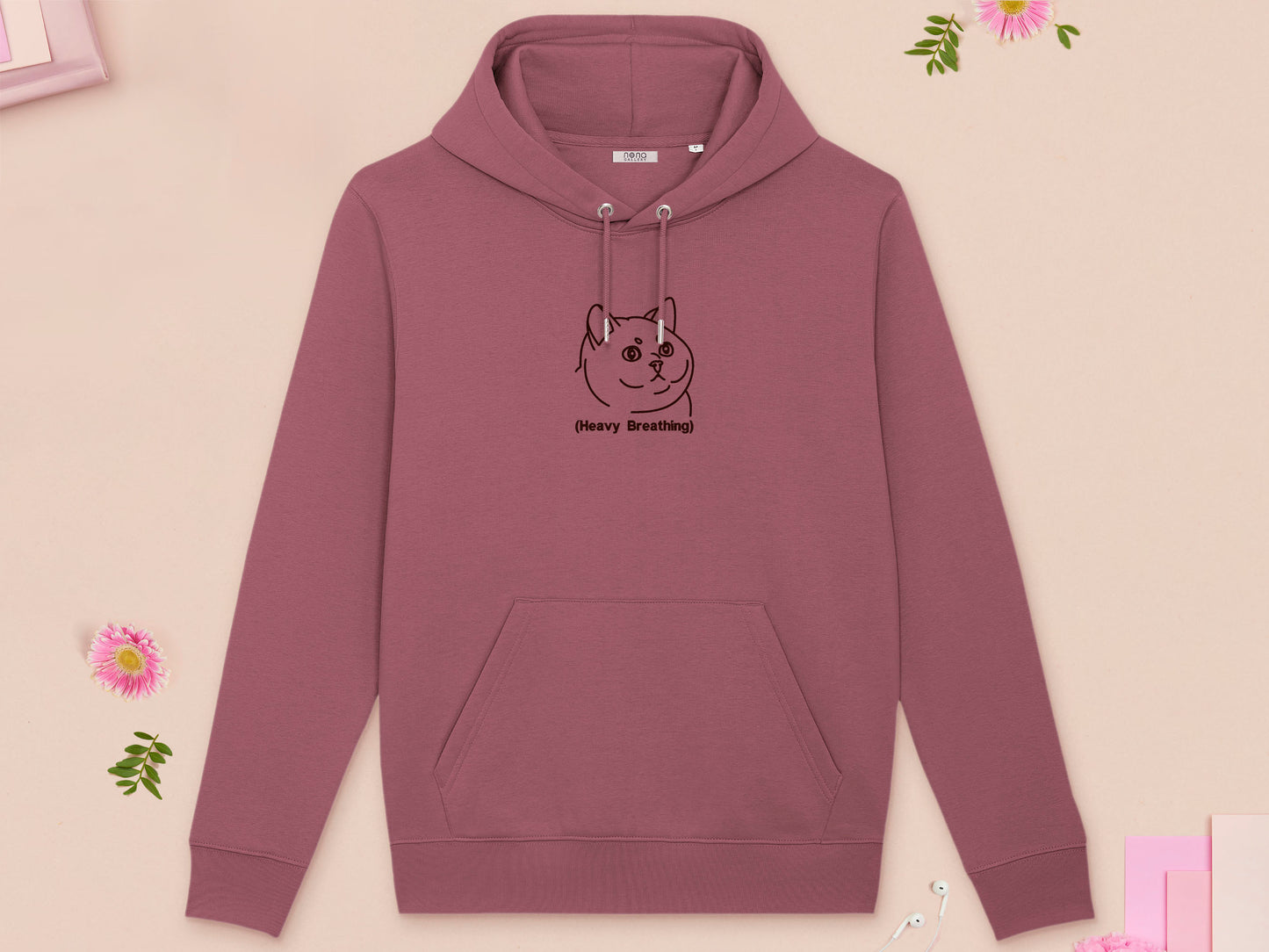 A red long sleeve fleece hoodie, with an embroidered brown thread design of cute fat cat portrait with text underneath saying (Heavy Breathing)