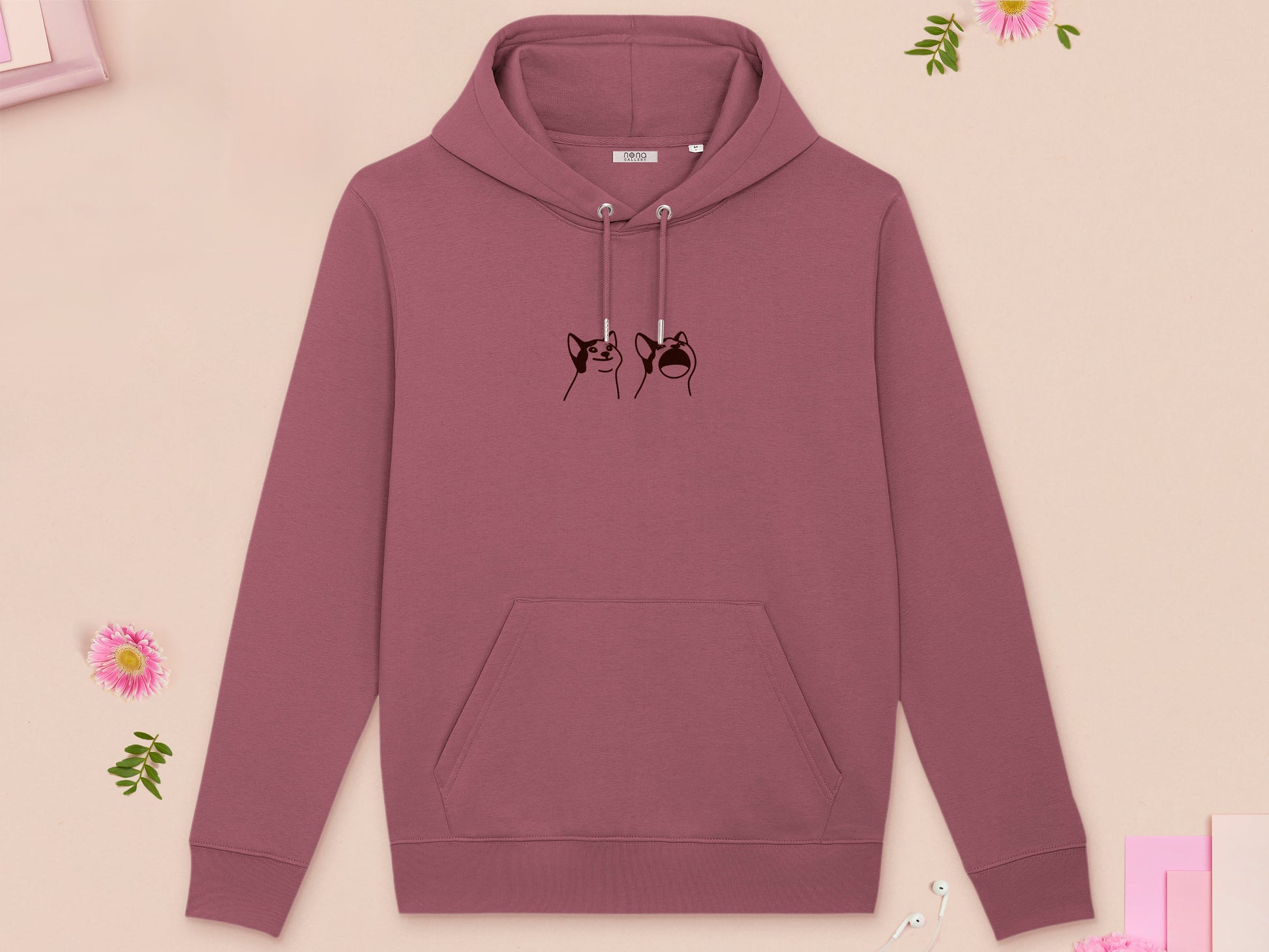 A red long sleeved fleece hoodie, with an embroidered brown thread design of a cute popcat the cat meme reaction twitch emote