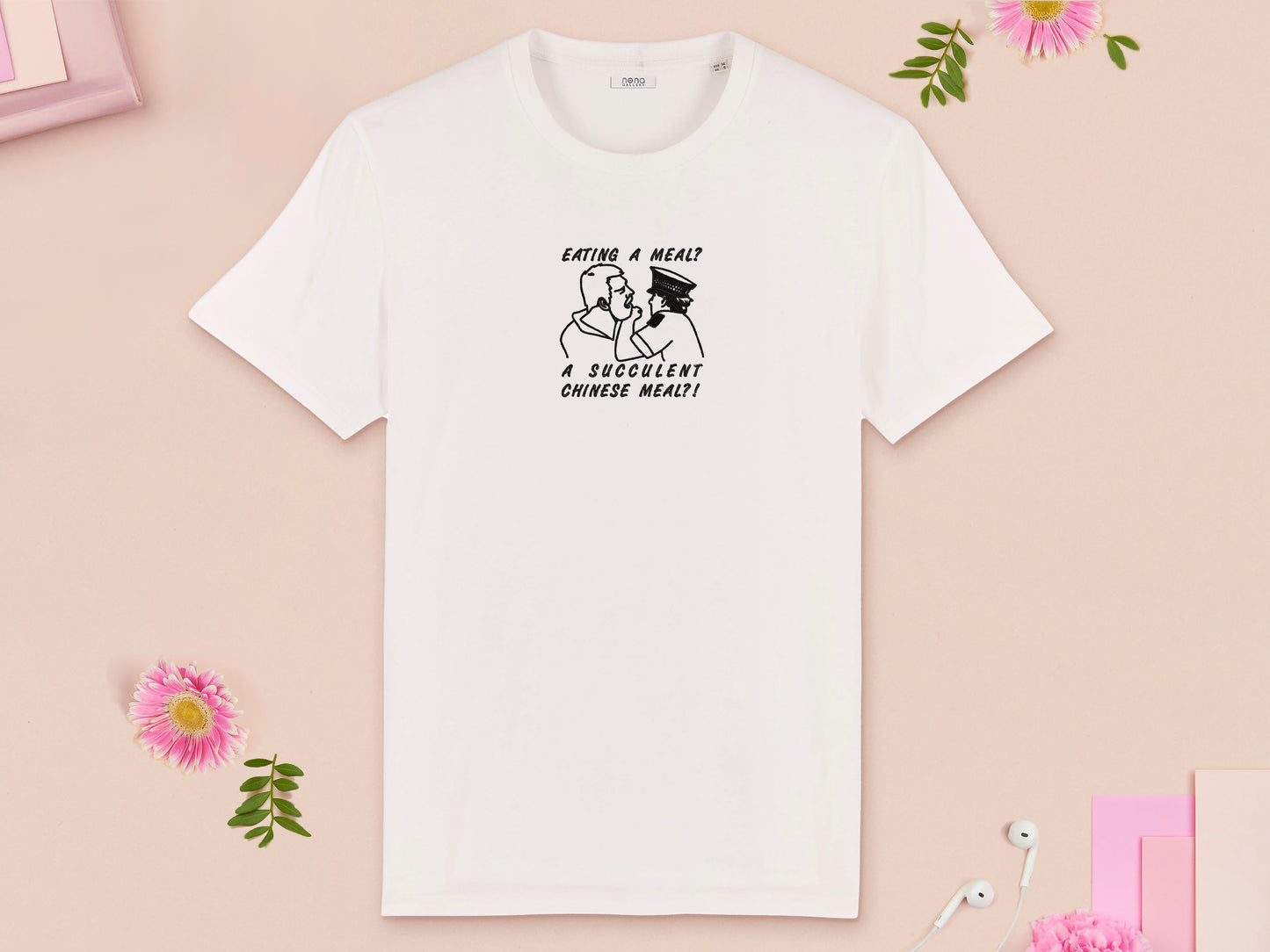 A white crew neck short sleeve t-shirt, with an embroidered black thread design of the viral democracy manifest video of Charles Dozsa being arrested by a policeman with the text reading Eating A Meal? A Succulent Chinese Meal?!