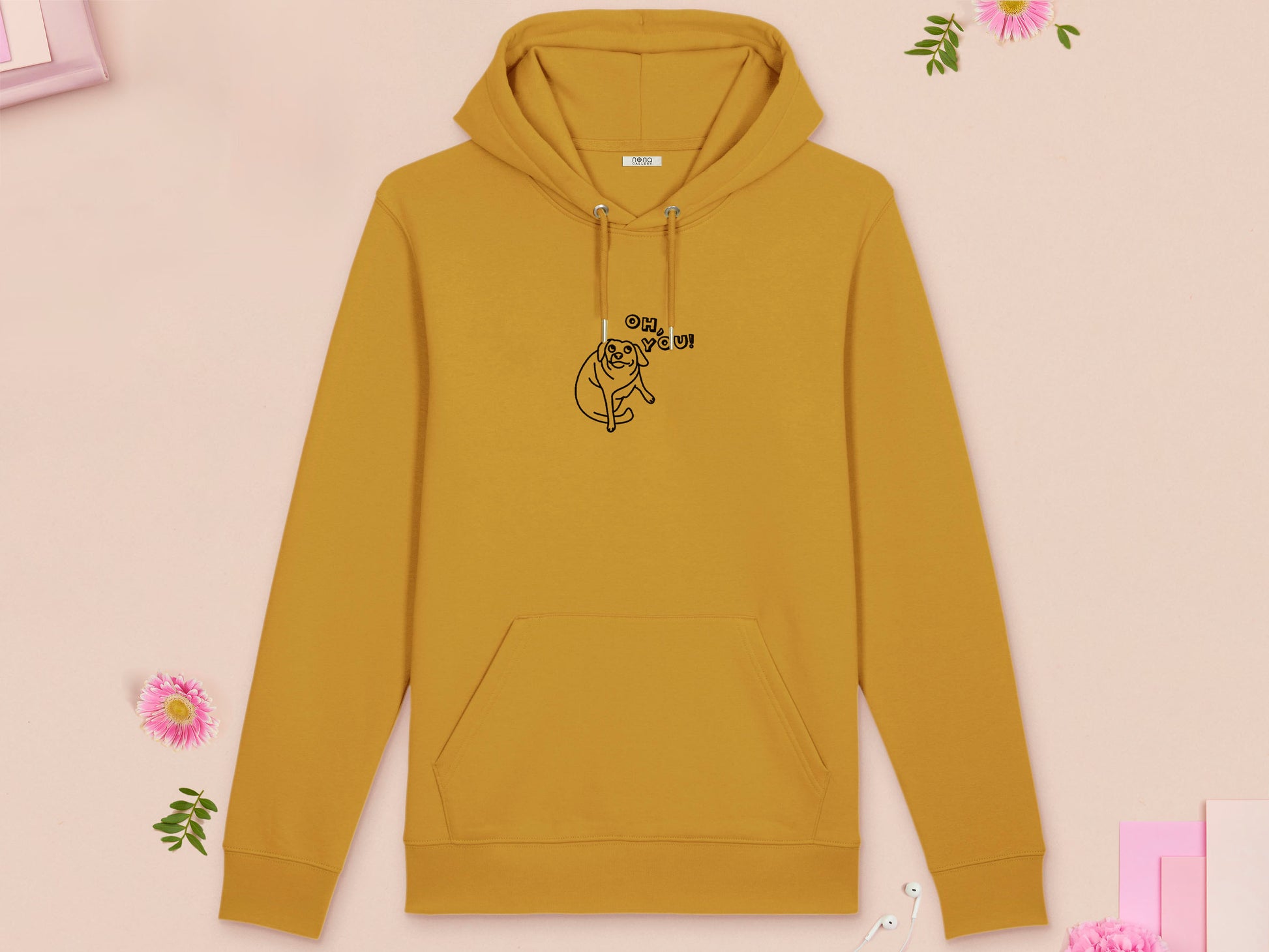 A yellow long sleeve fleece hoodie, with an embroidered black thread design of cute meme dog with cheeky expression and big eyes, with the text Oh You!