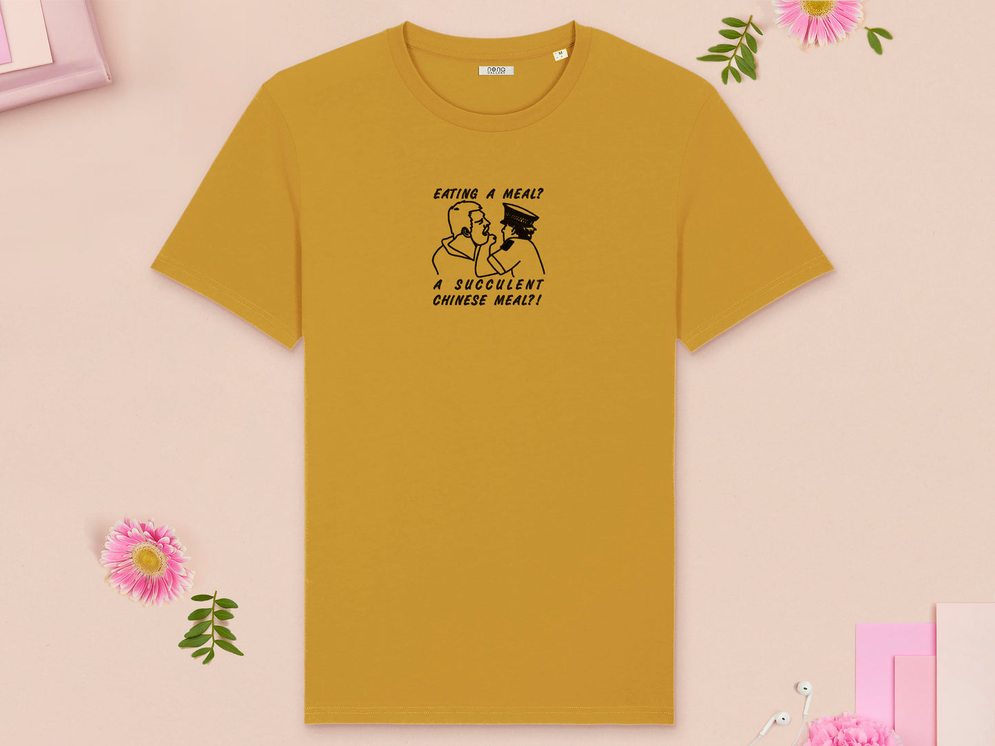 A yellow crew neck short sleeve t-shirt, with an embroidered black thread design of the viral democracy manifest video of Charles Dozsa being arrested by a policeman with the text reading Eating A Meal? A Succulent Chinese Meal?!